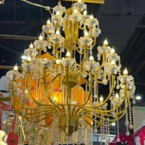 multi-tier golden metal and crystal chandelier